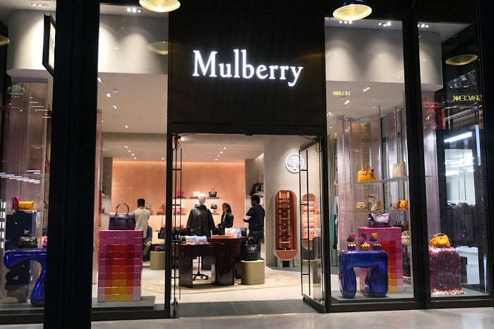 Mulberry hit by slowdown in luxury spending